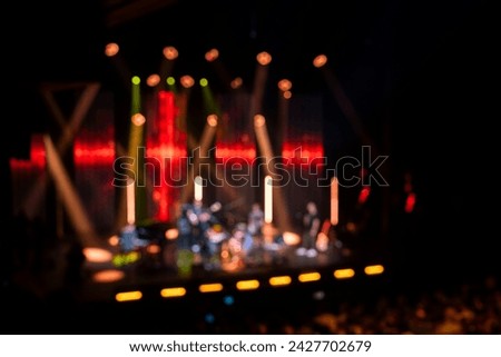 Blurred picture of band playing on stage, concert background