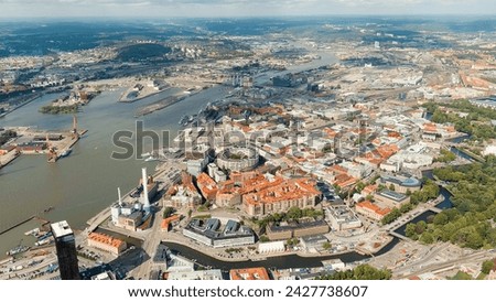 Gothenburg, Sweden. River Gota Alv and Rosenlund Canal. Panoramic view of the central part of the city. Summer day. Cloudy weather, Aerial View   Royalty-Free Stock Photo #2427738607