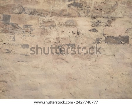Yellow color old cement wall texture background. Blank empty clean yellow colour cement wall surface. Landscape photo. The color has come off the cement wall