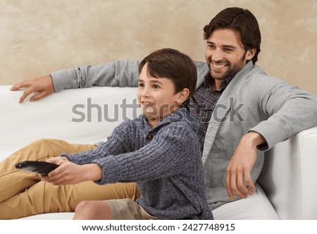 Relax, TV and father and child on sofa with remote for bonding, smile and fun in living room. Family, parents and dad with young son for cartoon, watching movies and entertainment in home