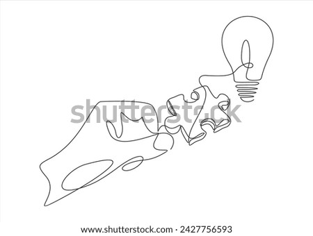 continuous one single line drawing of hand holding puzzle of light bulb. inside. Puzzle game symbol and iconic business metaphor for problem solving
