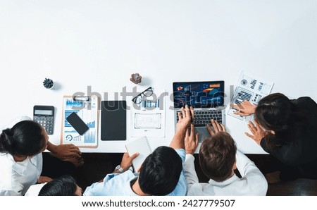 Group of office worker and businesspeople working on business financial data analysis. Empty space with editable blank background meeting table for customer design. Prudent