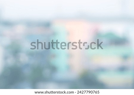 Blurred image of metropolis, homes, buildings, apartments and bokeh from lens melting for wallpaper, backdrop and design.