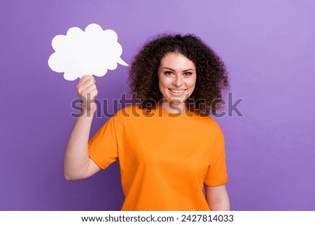Photo of sweet charming lady dressed orange t-shirt rising mind cloud empty space isolated violet color background