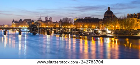 Seine river and Old Town of Paris (France) in the beautiful sunrise. A nice skyline of famous touristic destination with Notre Dame de Paris. Spectacular representative picture of French capital city.