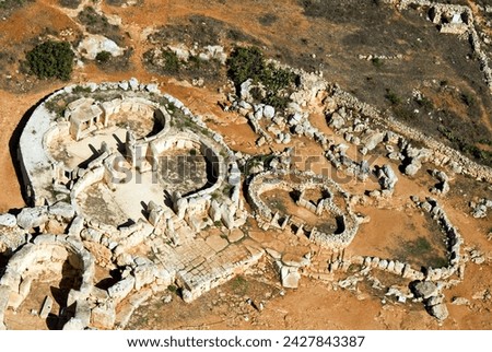Aerial view of archaeological site, megalithic temple of mnajdra (mna jora), unesco world heritage site, malta, europe Royalty-Free Stock Photo #2427843387
