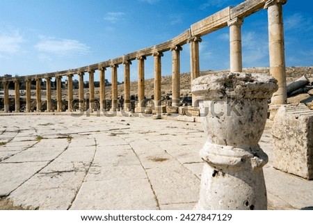 Oval plaza, colonnade and ionic columns, jerash (gerasa), a roman decapolis city, jordan, middle east Royalty-Free Stock Photo #2427847129