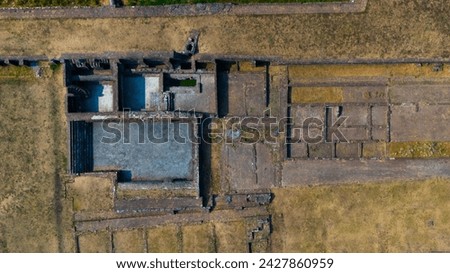 Explore the forgotten beauty of ancient ruins captured in the stunning aerial perspective of this high-definition microstock image