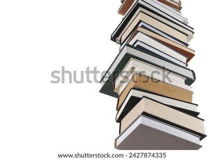 Stack of many different books isolated on white, low angle view