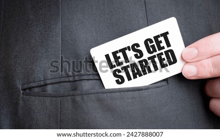 Card with LET's GET STARTED text in pocket of businessman suit. Investment and decisions business concept.