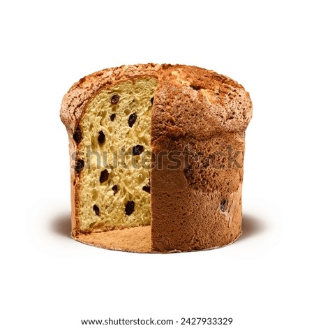 Panettone, an Italian type of sweet bread loaf, with slice cut of reviling chocolate chips or raising inside,  usually prepared and enjoyed for Christmas and New Year. Isolated on white background.  Royalty-Free Stock Photo #2427933329