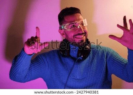 Young streamer using recreation glasses to give content to his followers. Concept: influencer.