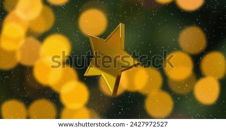 Image of sold star christmas decoration on green background. Christmas, tradition and celebration concept digitally generated image.