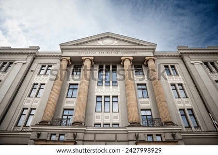 Main facade of the Latvian ministry of foreign affairs, called Latvijas Arlietu Ministrija, with the latin mension concordia res parvae crescunt meaning In Harmony Small Things Grow. Royalty-Free Stock Photo #2427998929