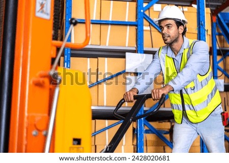 Portrait engineer man shipping order detail check goods and supplies on shelves with goods background inventory in factory warehouse.logistic industry and business export	