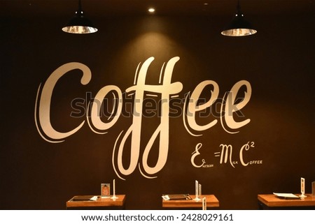 typography on the wall of a cafe
