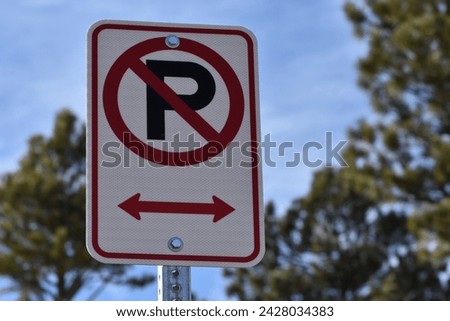 No Parking Sign with Arrows on Colorado Street