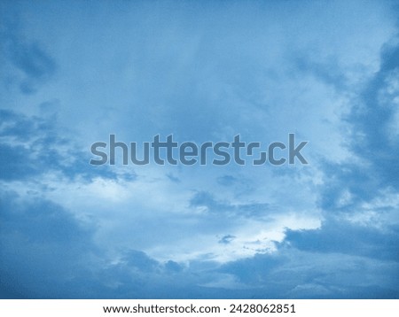 Blue and gray sky picture - clouds are there also. It looks like a cloudy or rainy weather. 