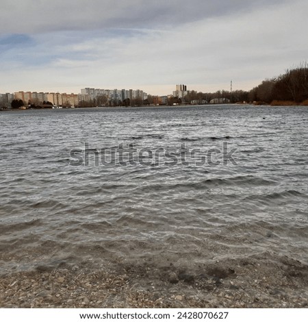 Lake Drazdiak  in Petrzalka, Bratislava, Slovakia, Europe. 
The sought-after natural swimming pool Velký Draždiak (once called Šutrovka) was established in 1982 after gravel mining