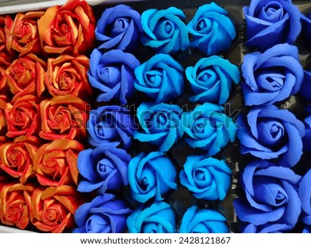 Real touch hot selling artificial flowers in three different colours(elegant box of roses models) decorative ornamental flowers in column arrangement close-up ultra hd hi-res jpg stock image picture