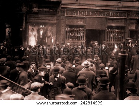 Police keep order during a run on the Adolf Mandel Bank on New York City's Lower East Side. February 16, 1912. Royalty-Free Stock Photo #242814595