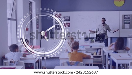 Image of clock over african american male teacher talking to pupils at desks in class. School, education, childhood and learning, digitally generated image.