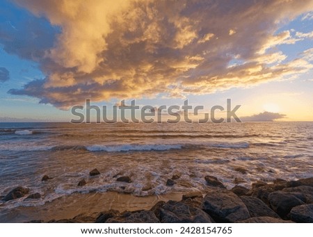 Gorgeous sunrise over Kekaha Beach, Island of Kauai, Hawaii