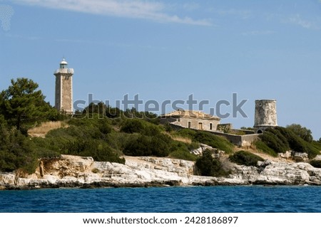 Lighthouse and old ruined lighthouse, fiskardo, kefalonia (cephalonia), ionian islands, greek islands, greece, europe