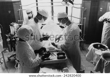 Operation at Provident Hospital, Chicago, Illinois in 1941. showing increased use of antiseptic procedures. Photo by Russell Lee.