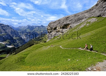 Hikers at kleine scheidegg, grindelwald, bernese oberland, switzerland, europe Royalty-Free Stock Photo #2428225183