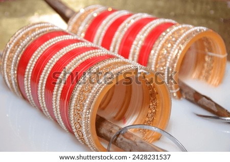 A "chooda" is a set of traditional red and white bangles that hold cultural significance in Indian weddings, particularly in Punjabi and Sikh traditions. Here's what you need to know about chooda for 