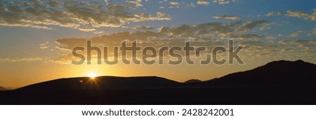 Sunset over sand dunes at sesriem, namib naukluft park, namibia