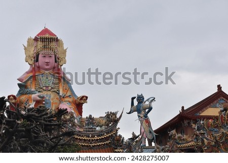 Colorful ancient dragon head statue, typical asian fantasy style, with religious oriental ornaments in spiritual traditional taiwanese Mazu Hotsu Longfong Temple in Miaoli City, Zhunan, Taiwan, Asia. Royalty-Free Stock Photo #2428275007
