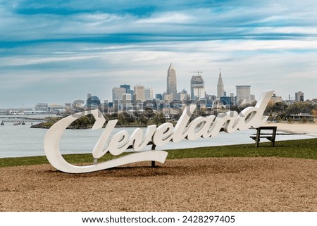 Cleveland Script sign at Edgewater park with city skyline in the background. Travel concept