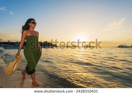 Girl on poblacion beach, malapascua island, cebu, the visayas, philippines, southeast asia, asia