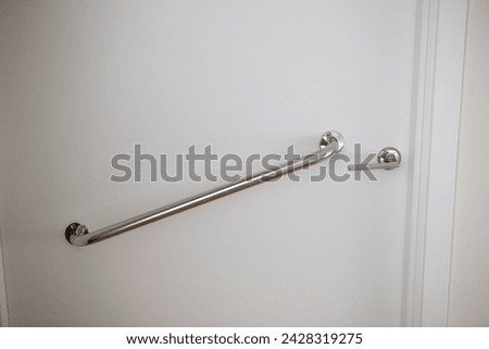 White door with handle for people with disabilities