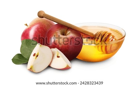 Honey in bowl and apples isolated on white