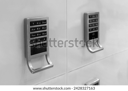 Key Locker for keep valuable things security. The Safe lock with 4 digits code. Close up view of digital lockers.  Royalty-Free Stock Photo #2428327163