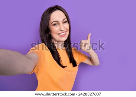 Selfie photo of mature age smiling cheerful business woman demonstrate good rate to her company isolated on violet color background