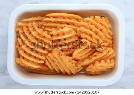 Top View Waffle Fries on White Plate, Deep Fried Potato Frensh Fries