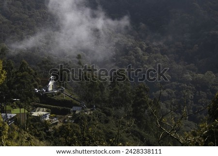 A Scenic View of Top Station is the highest point (1700m) covered in Fog in Munnar. The gorgeous hill station is ideally placed in the South Western Ghats of India.
 Royalty-Free Stock Photo #2428338111