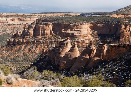 Plateau and canyon country rising 2000 feet above the Grand Valley of the Colorado River, part of the Great Colorado Plateau, Colorado National Monument, Colorado, United States of America, USA Royalty-Free Stock Photo #2428343299