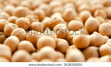 Dry chickpeas background, top view. Chickpea seeds background, close-up. Chickpeas close-up, top view. Dry chickpea beans, background.