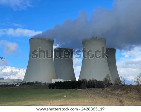 Temelin nuclear power plant cooling towers in the Czech Republic. Electricity generation from uranium according to Russian Rosatom technology combined with Western Westinghouse Siemens control system. Royalty-Free Stock Photo #2428365119