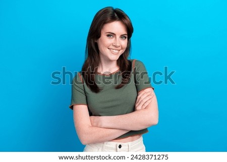 Photo of satisfied glad friendly young lady beaming smile crossed arms posing isolated on blue color background Royalty-Free Stock Photo #2428371275
