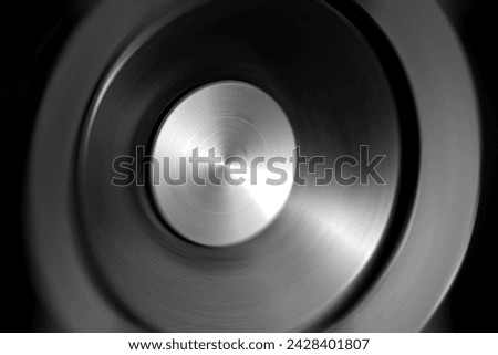 Column speaker black and white photo on a black background.