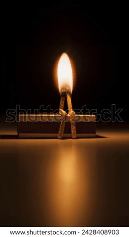 beautiful picture of two matchstick on fire black 