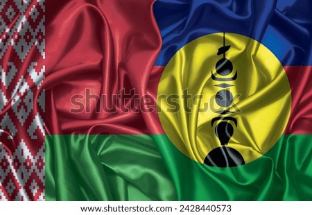 Belarus and New Caledonia two folded silk flags together.