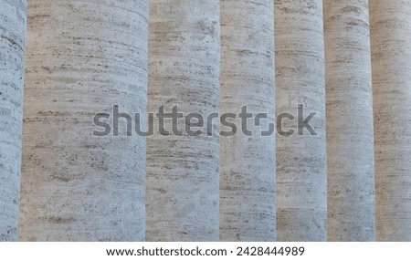 Detail of the Colonnade of St. Peter's Square in Rome, Vatican City, famous work by Gian Lorenzo Bernini. Royalty-Free Stock Photo #2428444989