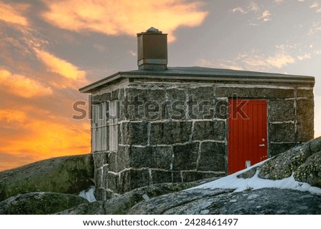 An abandoned old hut made of rocks